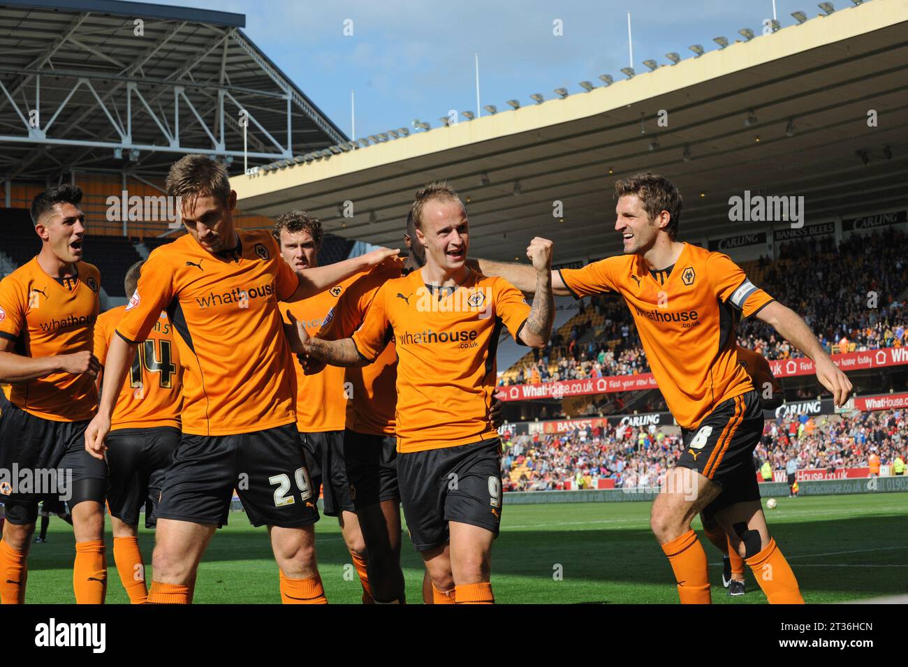 Kevin Doyle of Wolverhampton Wanderers celebrates after scoring a goal to make it 2-0 with Leigh Griffiths and Sam Ricketts. Sky Bet Football League One -  Wolverhampton Wanderers v Swindon Town 14/09/2013 Stock Photo