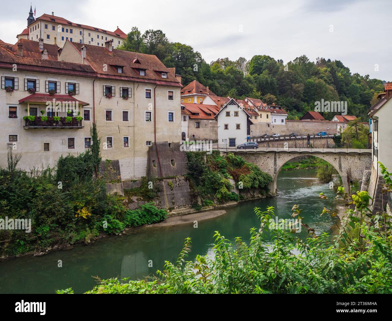 City of Skofja Loka, Slovenia with view of the Capuchin Bridge over the ...