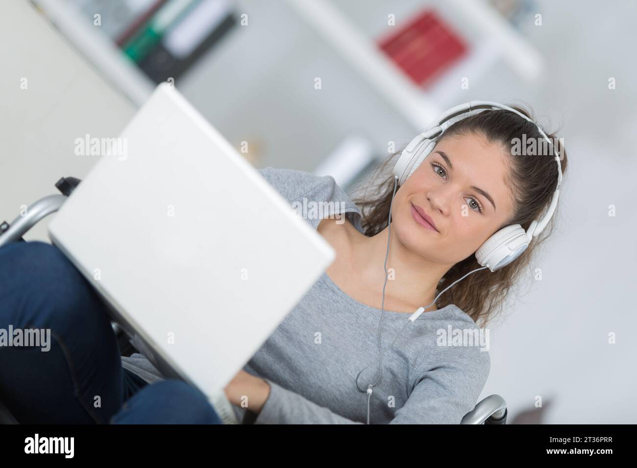 happy disabled woman in wheelchair with laptop Stock Photo - Alamy