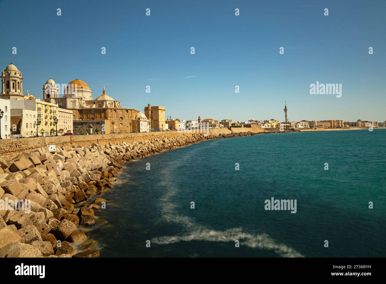 coast promenade in Cadiz with view to the cathedral Stock Photo