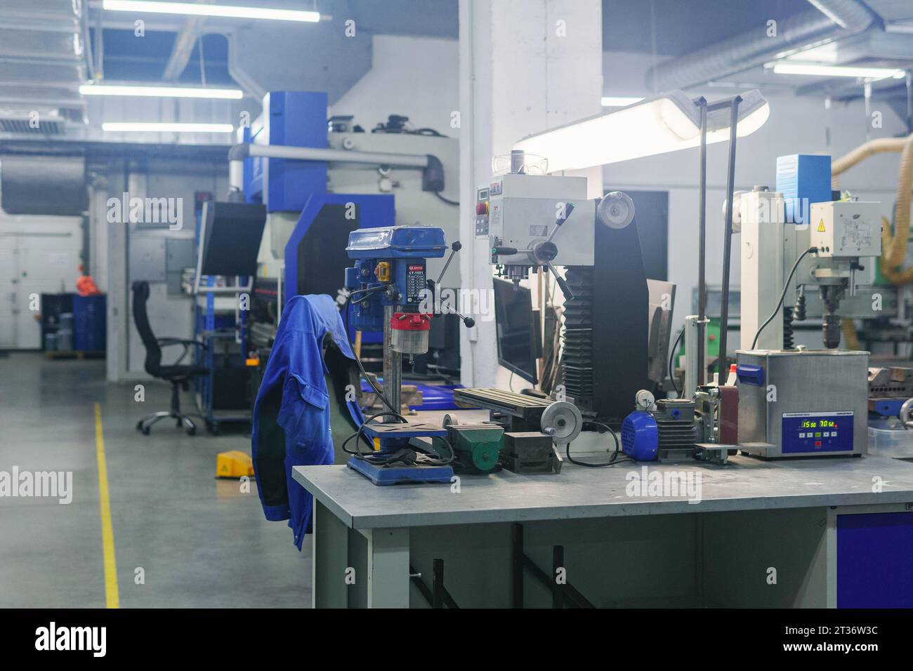 Perm, Russia - July 13, 2023: industrial workshop with machine tools in blue colors Stock Photo