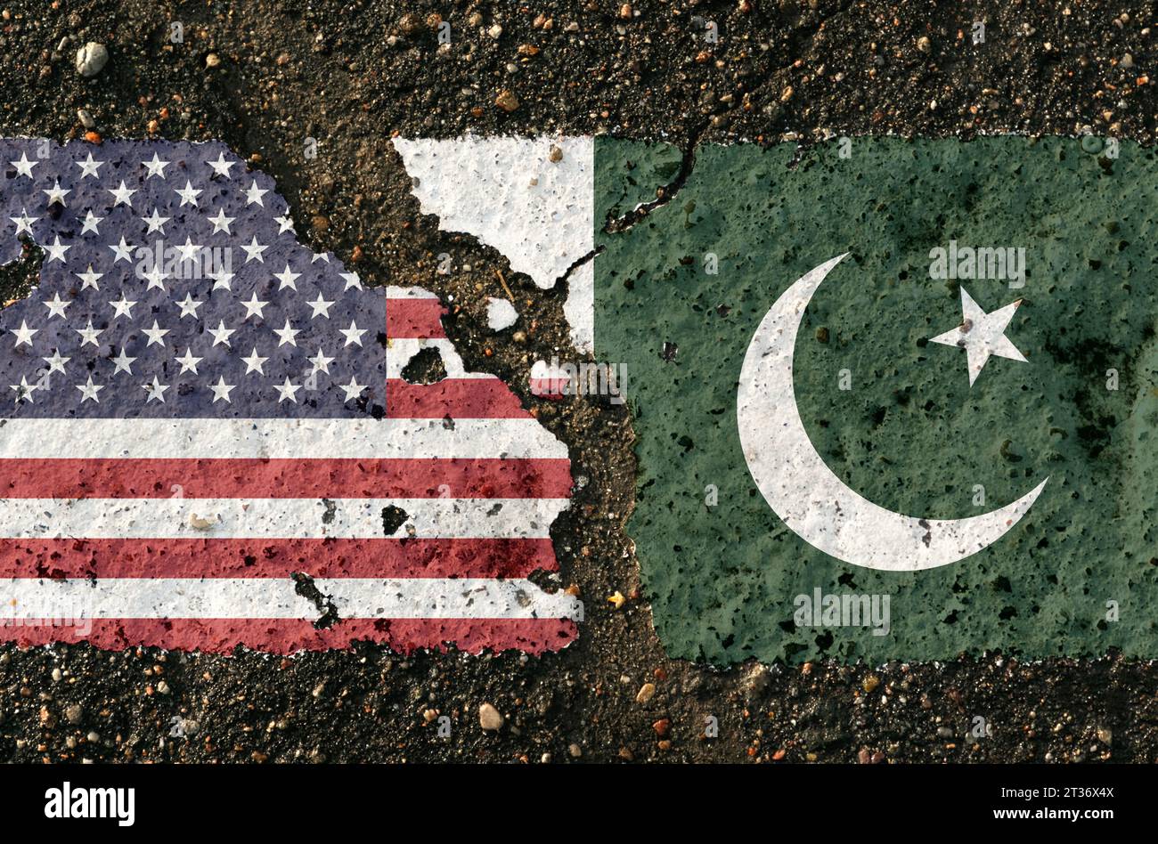 On the pavement are images of the flags of the USA and Pakistan, as a symbol of confrontation. Conceptual image. Stock Photo