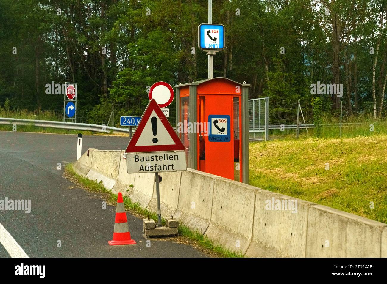 Emergency SOS phone booth on the highway. Roadside emergency call