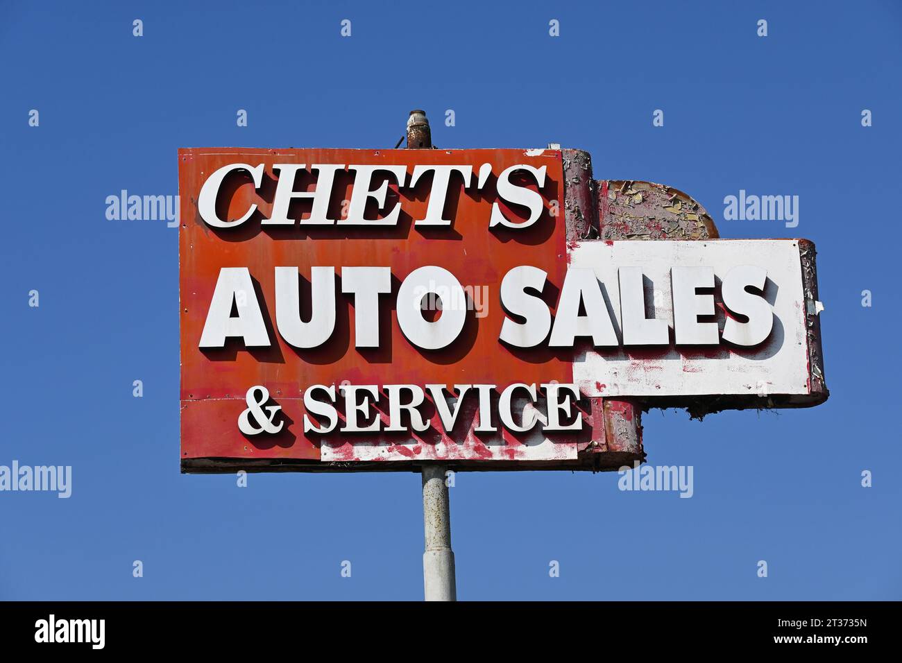 LONG BEACH, CALIFORNIA - 17 OCT 2023: Chets Auto Sales and Service sign on Pacific Coast Highway, PCH. Stock Photo