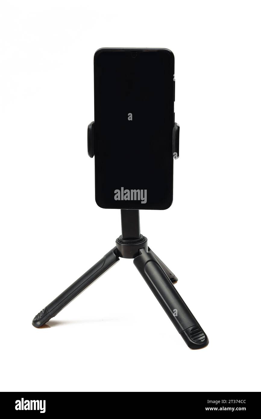 Smartphone on tripod stand isolated on white background Stock Photo