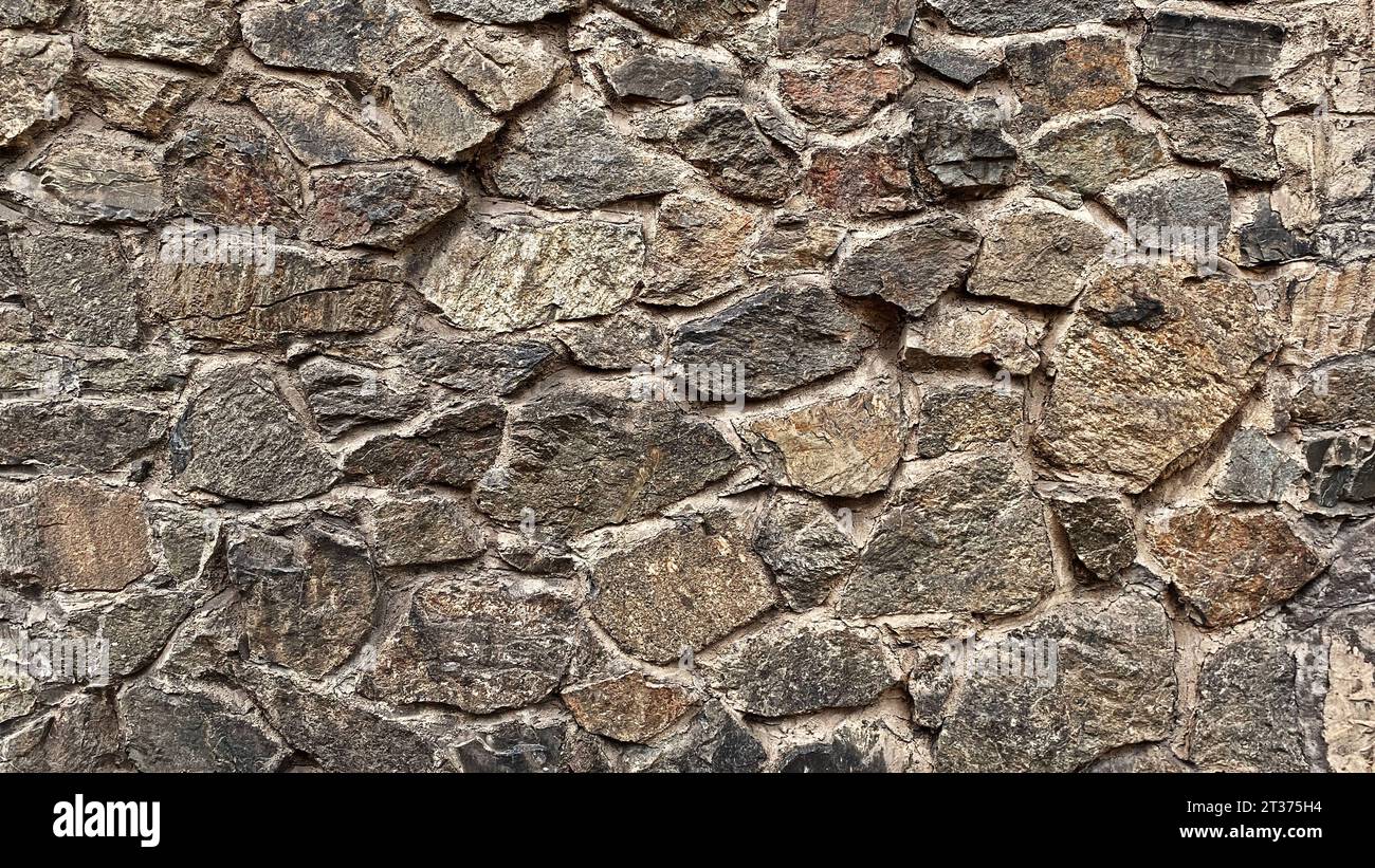 Rough stone wall hi-res stock photography and images - Alamy