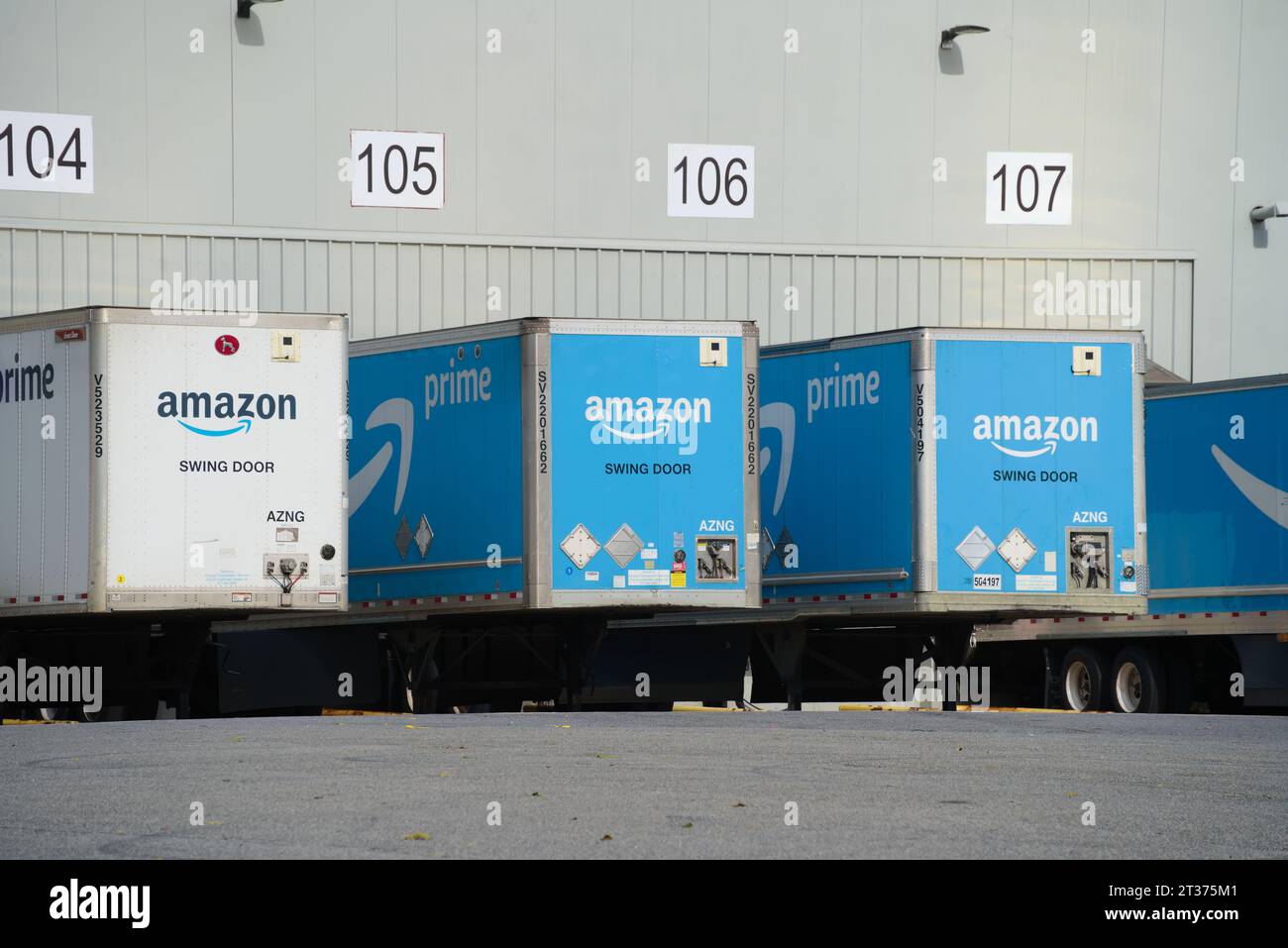 Bronx, NY - October 22, 2023: Loading docks with trailers at Amazon fulfillment center warehouse facility Stock Photo
