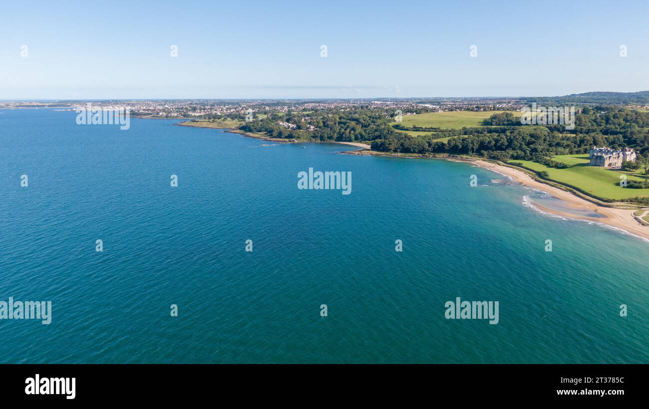 Aerial view on coast of sea at sunset in Helens Bay, Northern Ireland, UK. Stock Photo