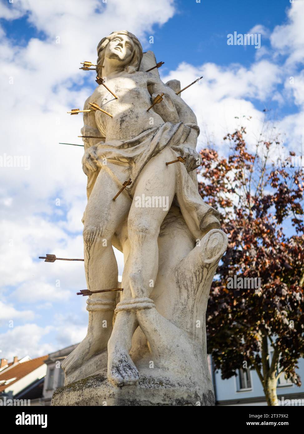 Figure of a saint, sculpture, Saint Sebastian, detail from the plague column column on the main square, Bruck an der Mur, Styria, Austria Stock Photo