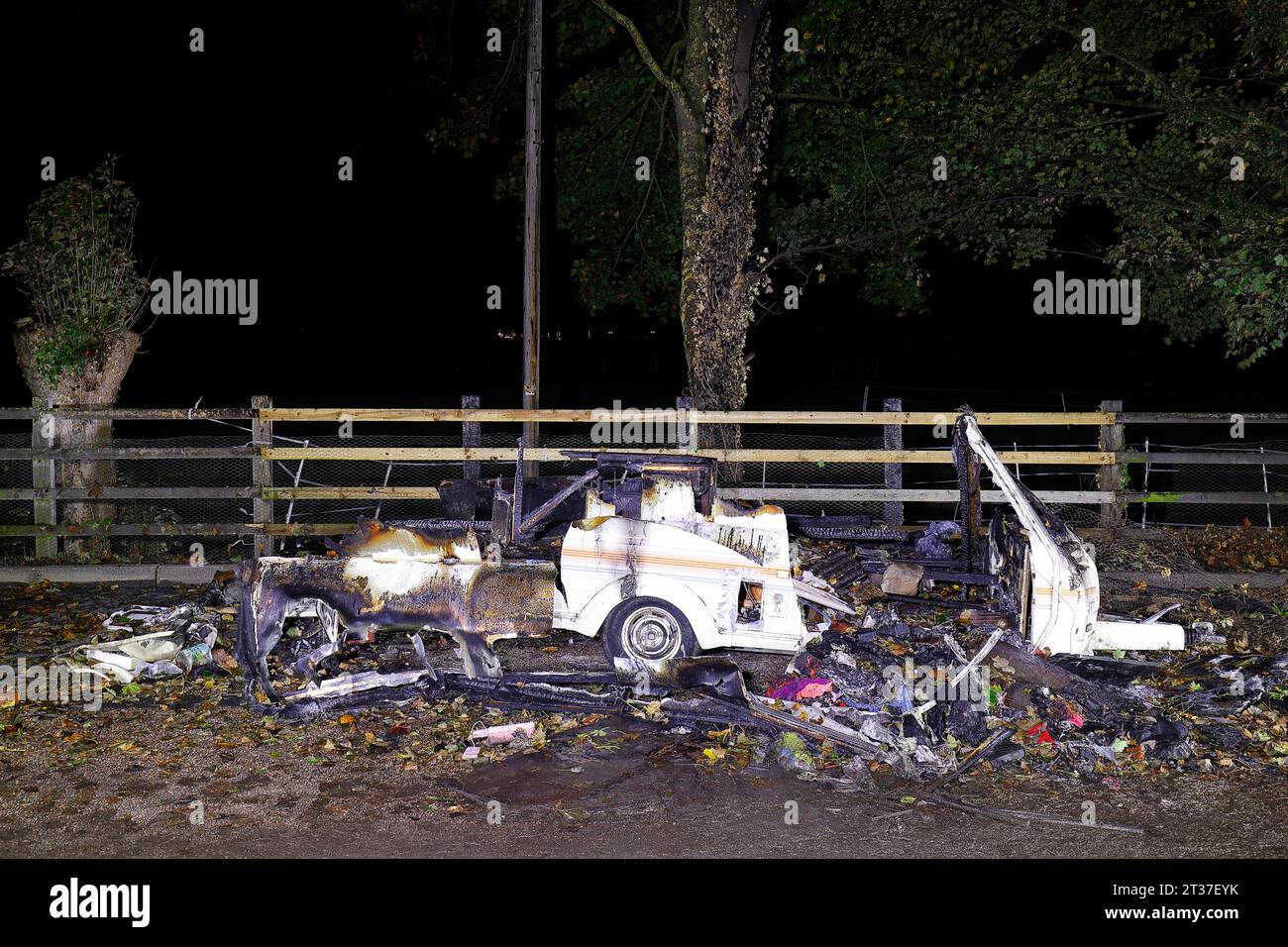 A caravan left abandoned in a layby in Ferrybridge,West Yorkshire, after arsonists set it on fire. Stock Photo