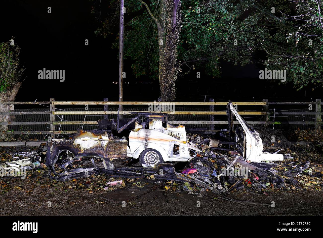 A caravan left abandoned in a layby in Ferrybridge,West Yorkshire, after arsonists set it on fire. Stock Photo
