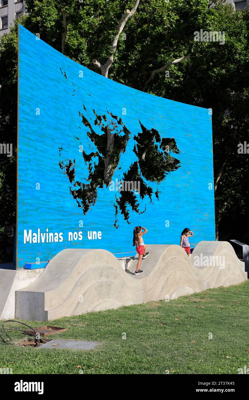 Children posing for photos on the Monument in tribute to the soldiers who fought in the Malvinas, Falklands War.Buenos Aires.Argentina Stock Photo