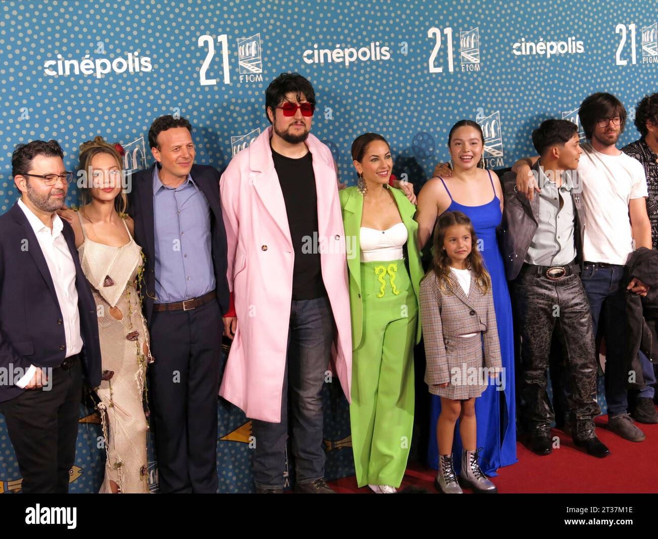 Cast and crew of the film "Perdidos en la noche" pose for photos during their red carpet event