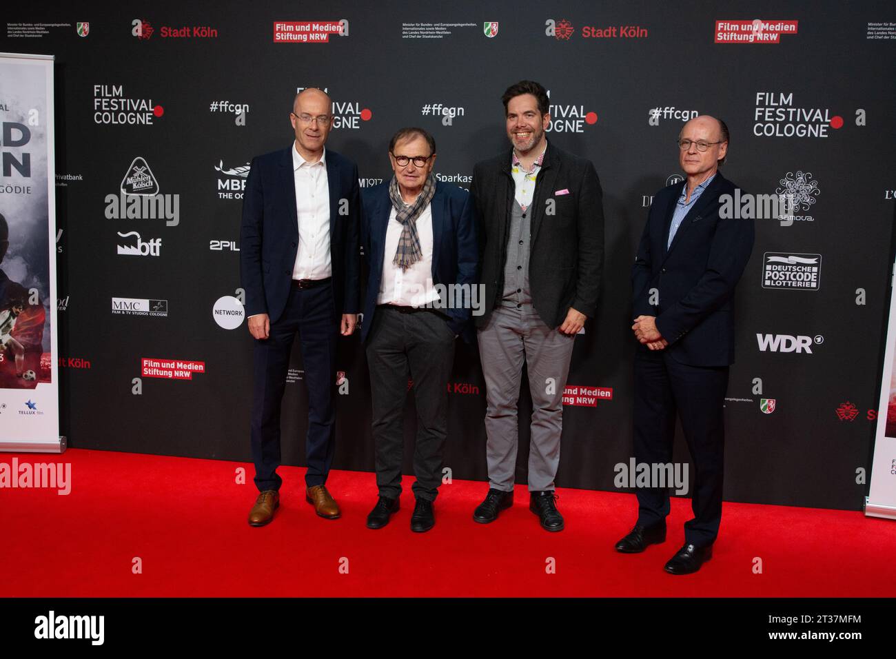 Cologne, Germany. 23rd Oct, 2023. Ewald Lienen, Dr. Martin Guennewig, Philipp Schall, and Martin Choroba are attending the photo call for the film ''Ewald Lienen'' at the Film Palast in Cologne, Germany, on October 23, 2023, during the International Cologne Film Festival. (Photo by Ying Tang/NurPhoto) Credit: NurPhoto SRL/Alamy Live News Stock Photo