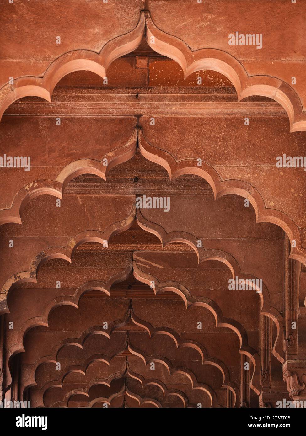 Cusped arches inside the Diwan-i-Am hall in the historic Red Fort (Lal Qila) in Old Delhi, India. Stock Photo
