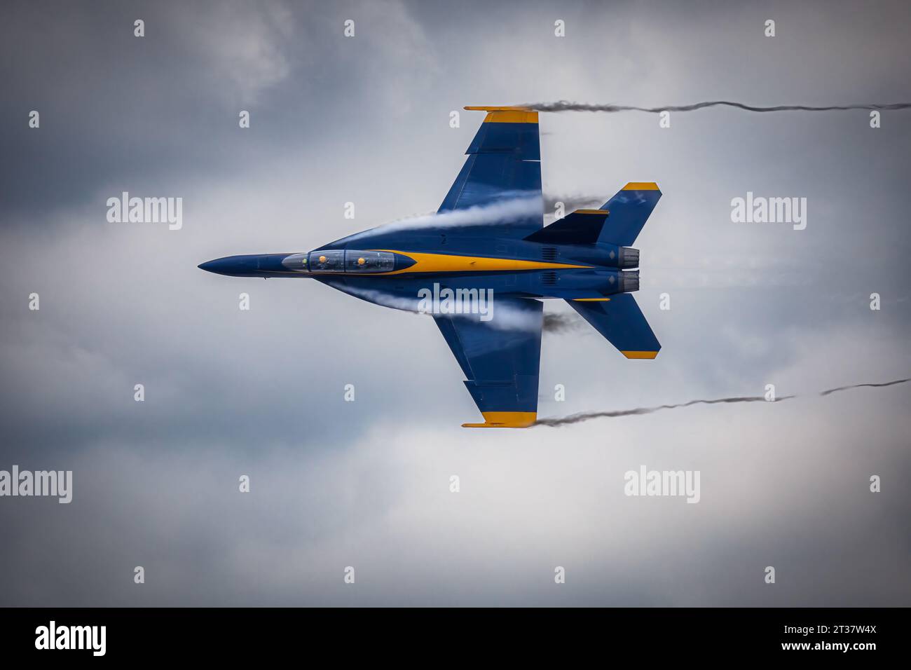 Miramar, California, USA - September 21, 2023: Vapor breaks around a US Navy Blue Angel on a cloudy day at America's Airshow 2023. Stock Photo