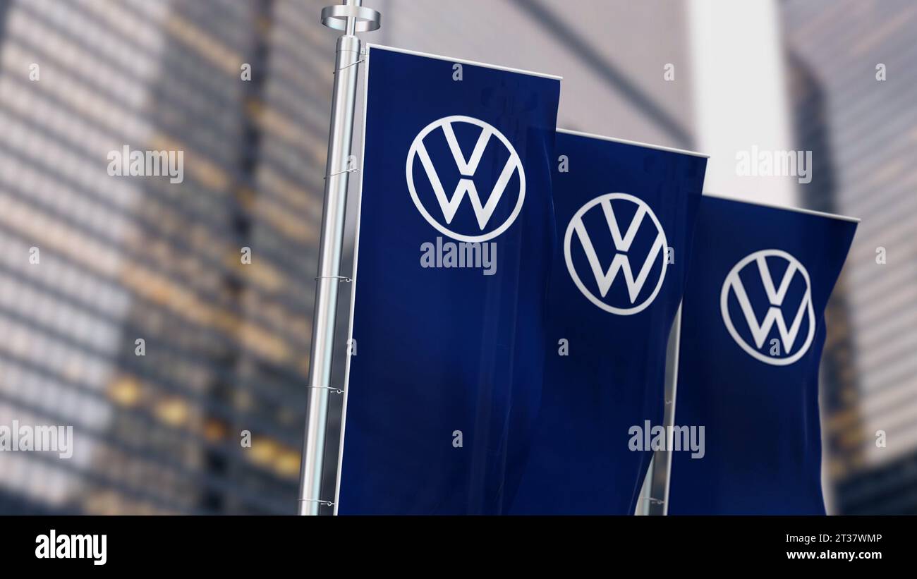 Wolfsburg, DE, Sept 20 2023: Three blue vertical banners with Volkswagen logo waving in the wind. German vehicle automotive brand. Illustrative editor Stock Photo