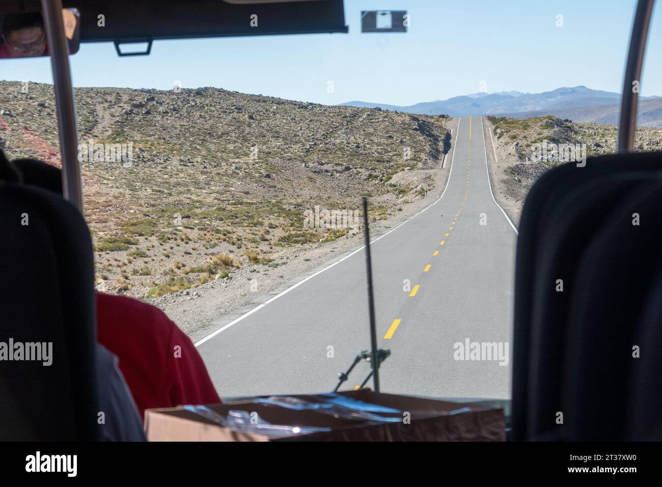 View of Andean road from Bus interior, Peru Stock Photo
