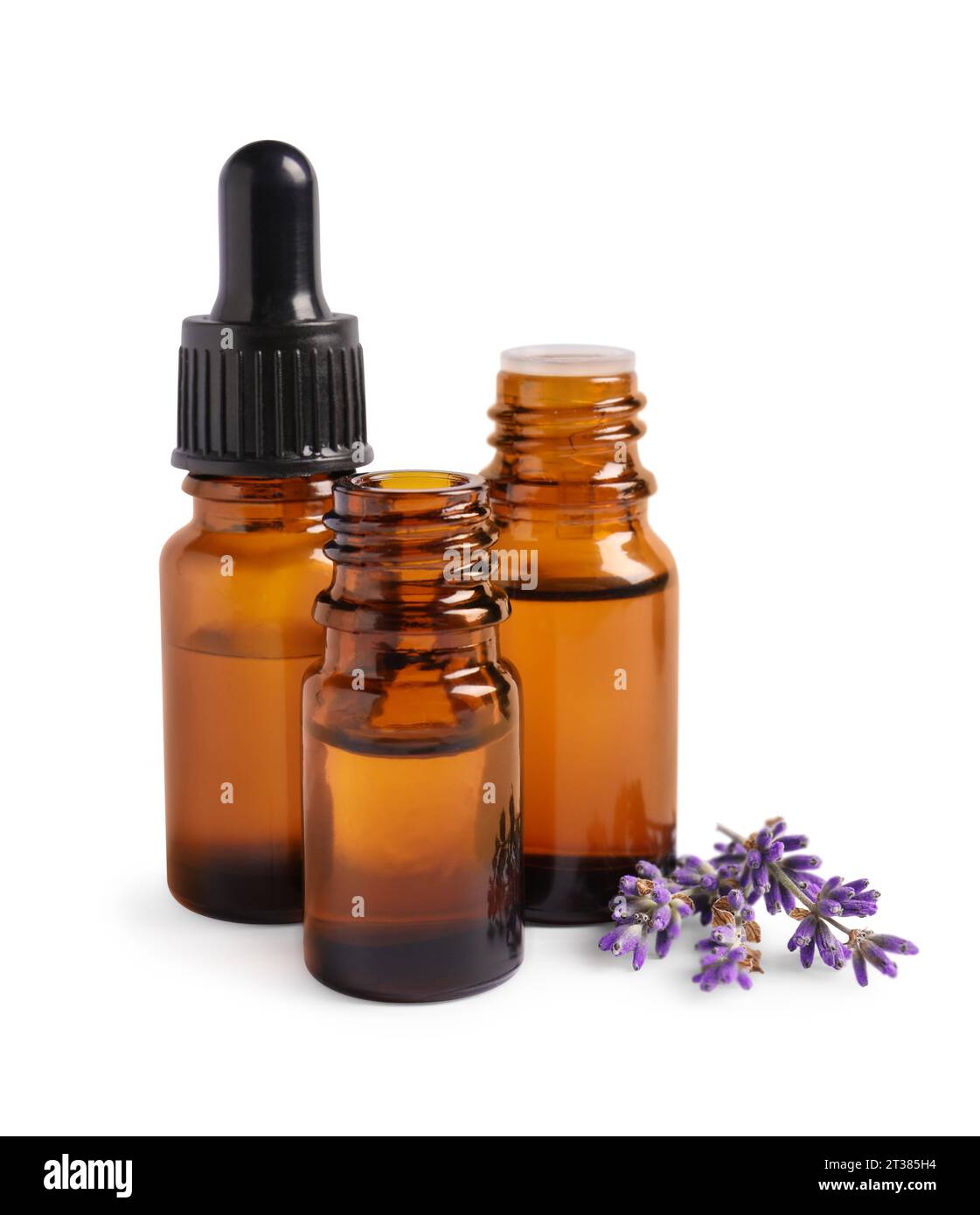 Essential oil and lavender flowers on white background Stock Photo - Alamy