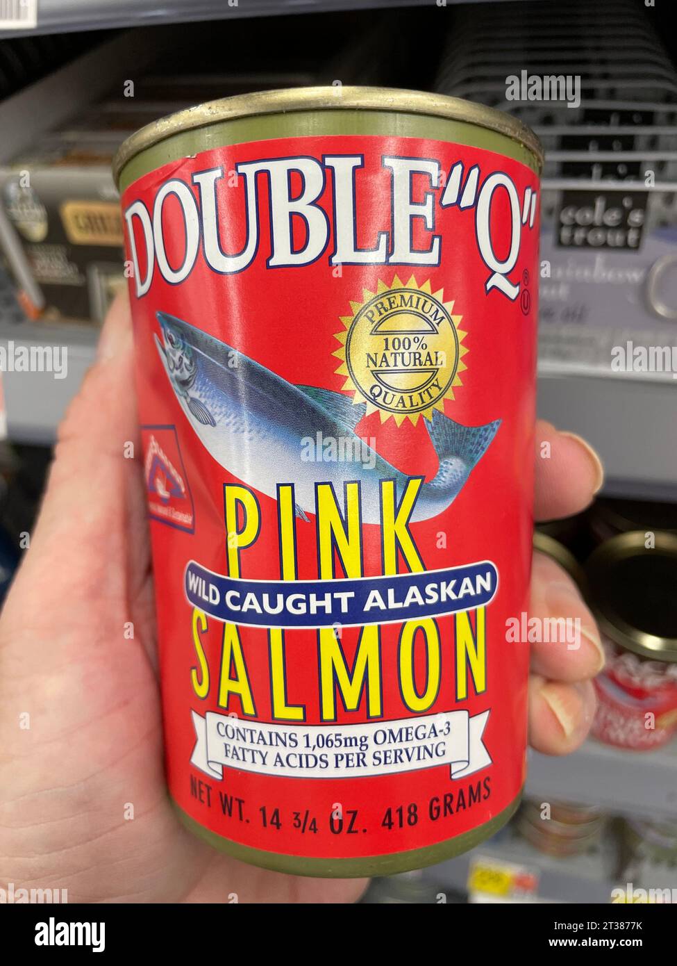 Grovetown, Ga USA - 08 06 23: Walmart grocery store Double Q canned pink salmon Stock Photo