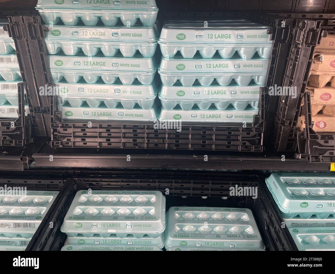Grovetown, Ga USA - 08 06 23: Walmart grocery store Eggs section and prices crates of eggs Stock Photo