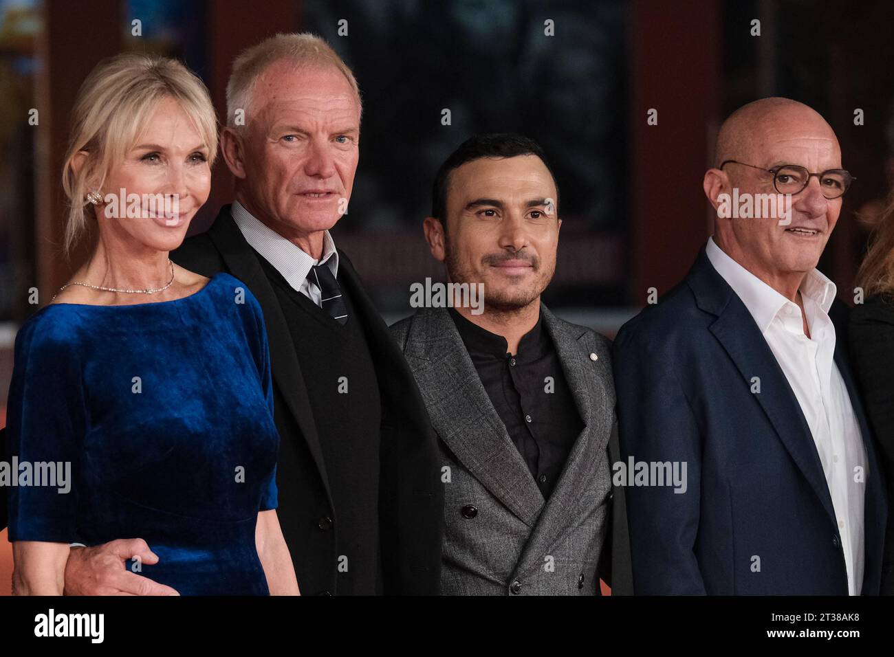 Rome, Italy. 23rd Oct, 2023. (L to R) Trudie Styler, Sting, Francesco Di Leva and Don Antonio Loffredo attend a red carpet for the movie 'Posso entrare? An ode to Naples' during the 18th Rome Film Festival at Auditorium Parco Della Musica in Rome. Credit: SOPA Images Limited/Alamy Live News Stock Photo