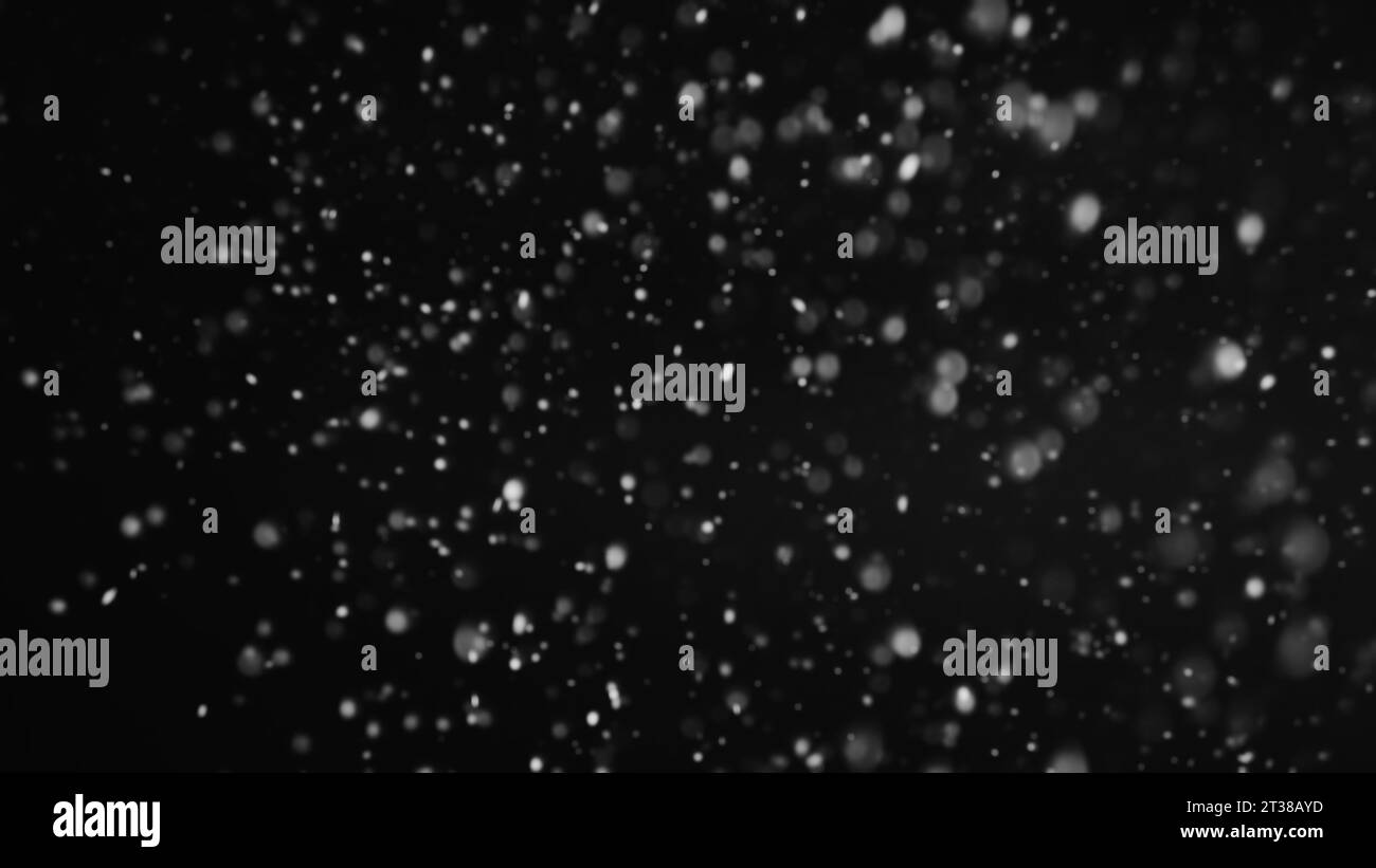 Snow falling night winter sky glowing ice crystals Stock Photo Alamy