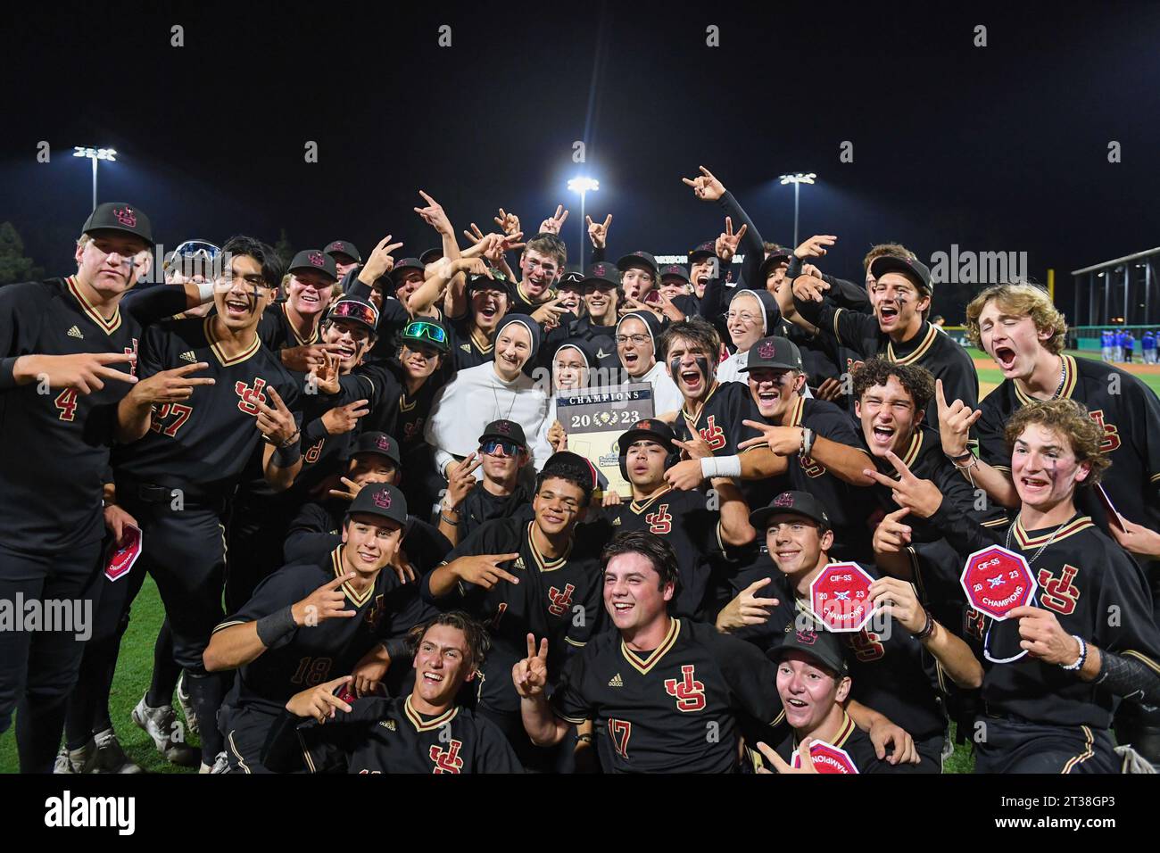 The JSerra Lions team celebrates with the Sisters of JSerra Nuns after the CIF Southern Section Division 1 Baseball Finals on Friday, May. 19, 2023 in Stock Photo