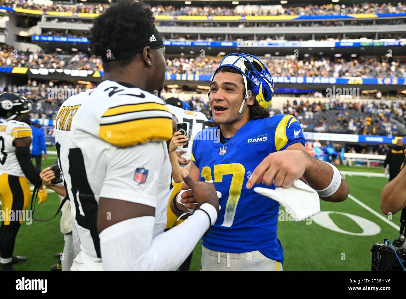 Los Angeles Rams wide receiver Puka Nacua (17) talks with Pittsburgh Steelers cornerback Joey Porter Jr. (24) after an NFL football game, Sunday, Oct. Stock Photo
