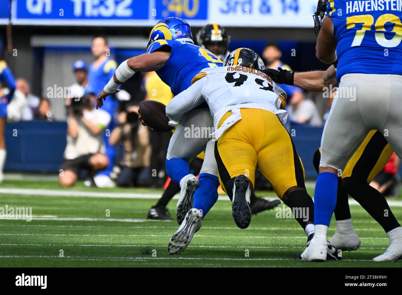 Pittsburgh Steelers defensive tackle Larry Ogunjobi (99) sacks Los Angeles Rams quarterback Matthew Stafford (9) during an NFL football game, Sunday, Stock Photo