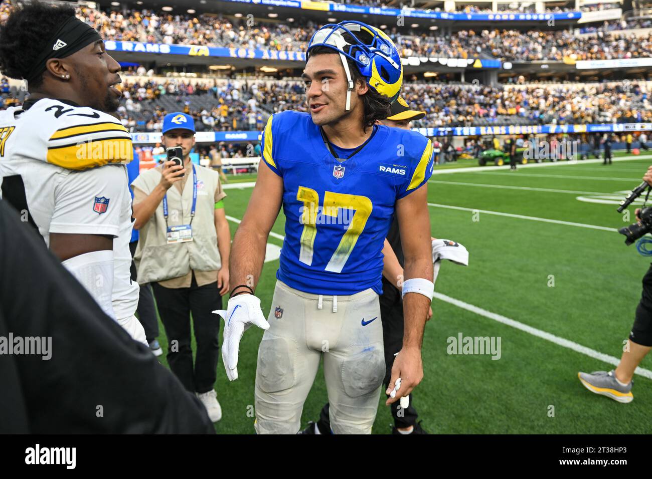 Los Angeles Rams wide receiver Puka Nacua (17) talks with Pittsburgh Steelers cornerback Joey Porter Jr. (24) after an NFL football game, Sunday, Oct. Stock Photo