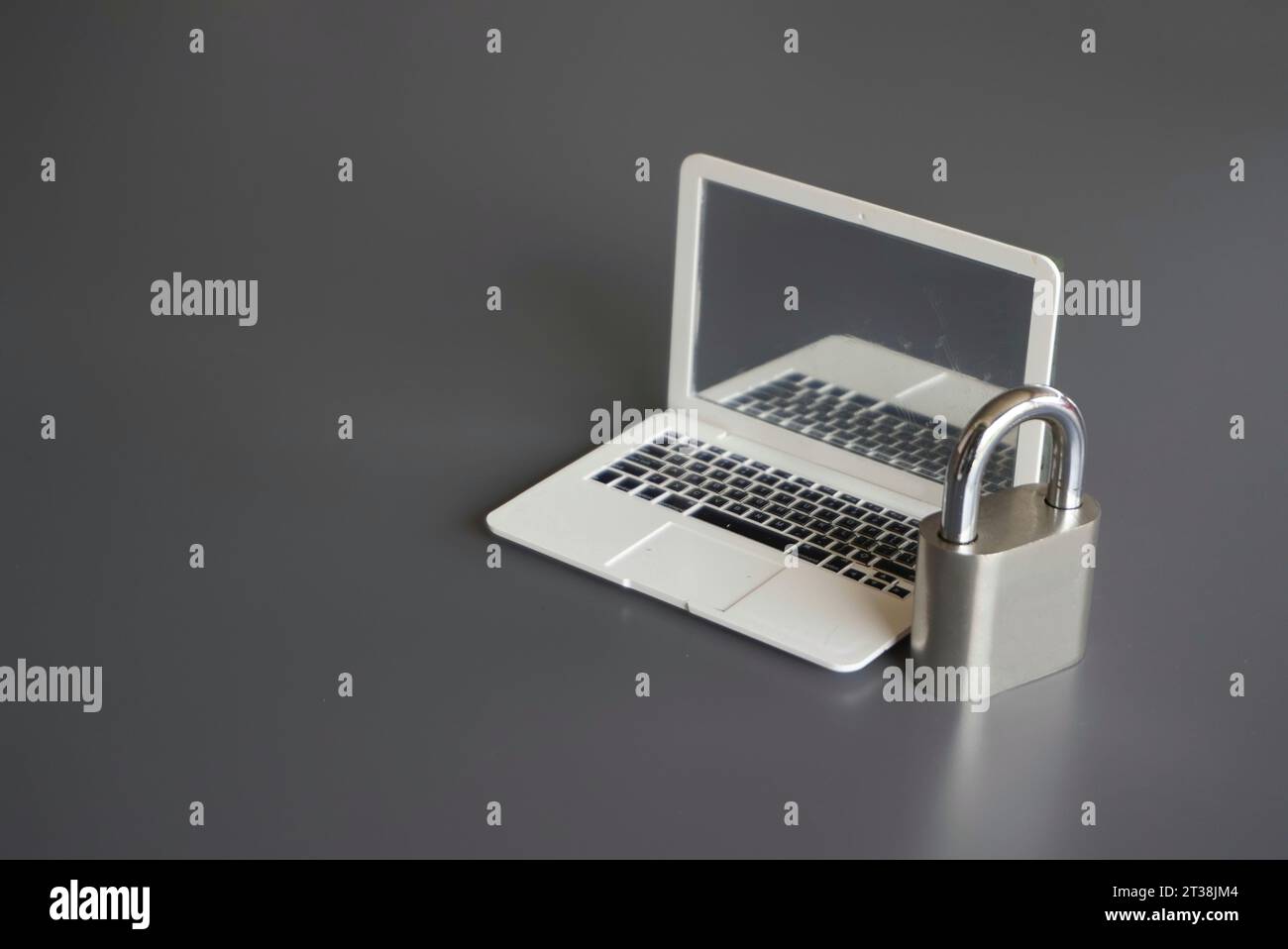 Closeup image of laptop and padlock with copy space. Cyber security concept. Stock Photo