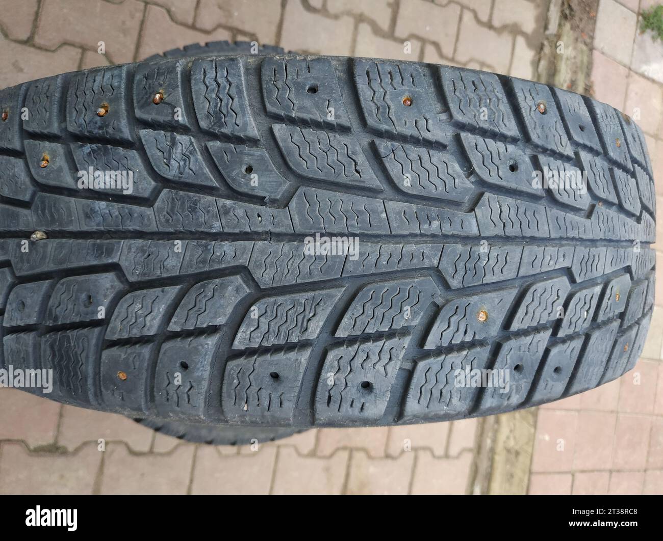 Wheel worn wear rubber tyre junkyard recycling heap hires stock