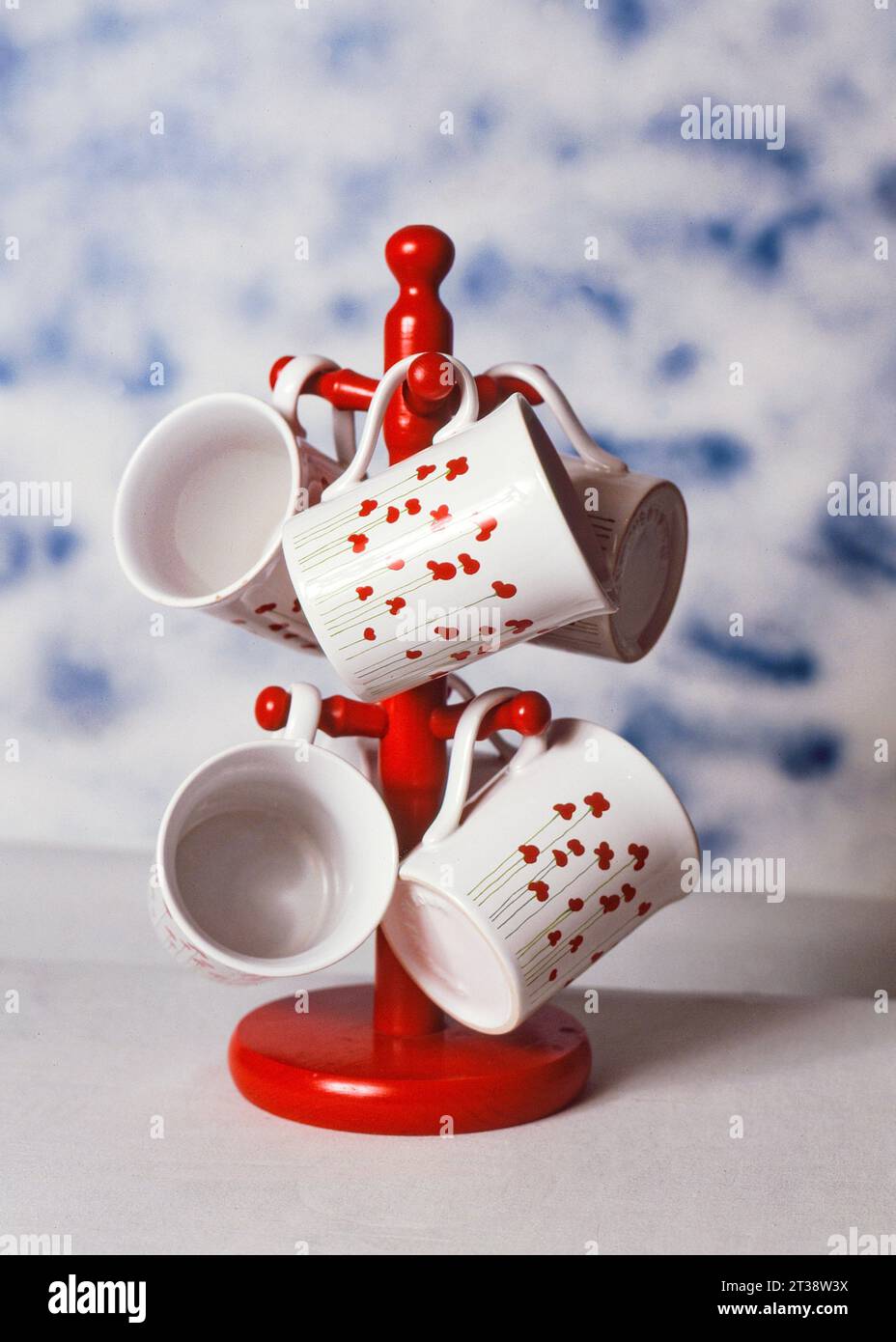 Mug tree with mugs Stock Photo