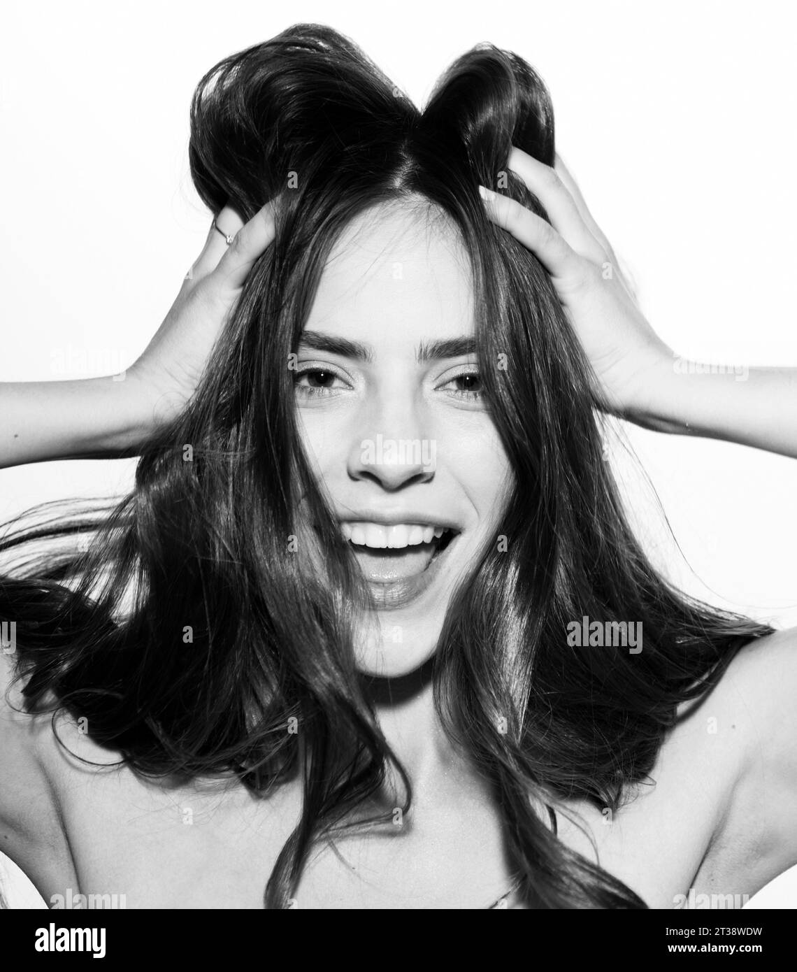 Funny woman face close up. Crazy girl studio portrait. Emotional face