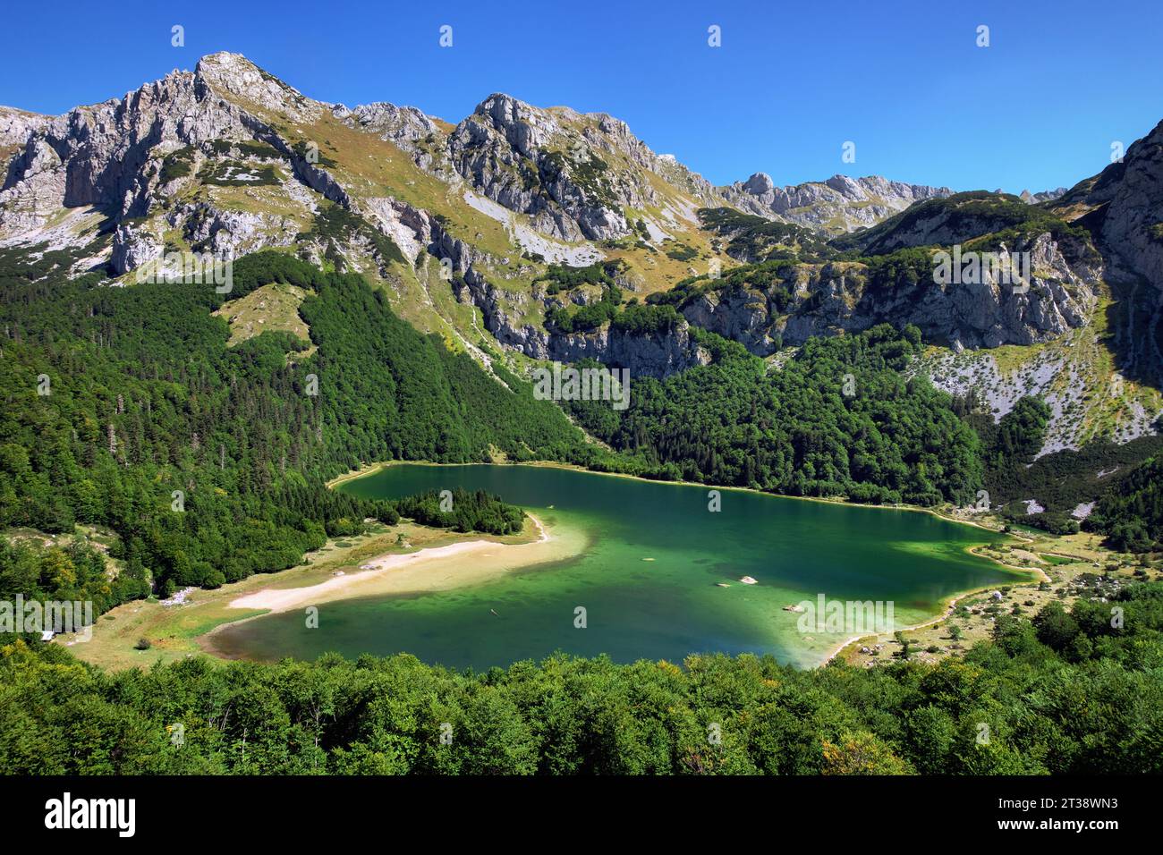 Trnovacko Lake in Nature Park Piva (Montenegro) and Maglic peaks in Sutjeska National Park (Bosnia and Herzegovina) Stock Photo