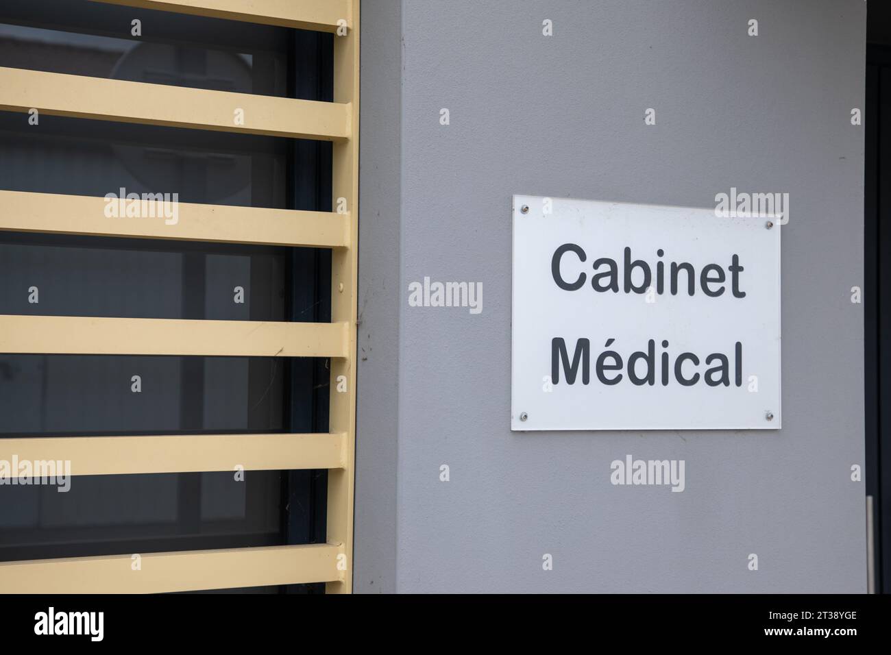 medical french sign text on facade means doctor office wall