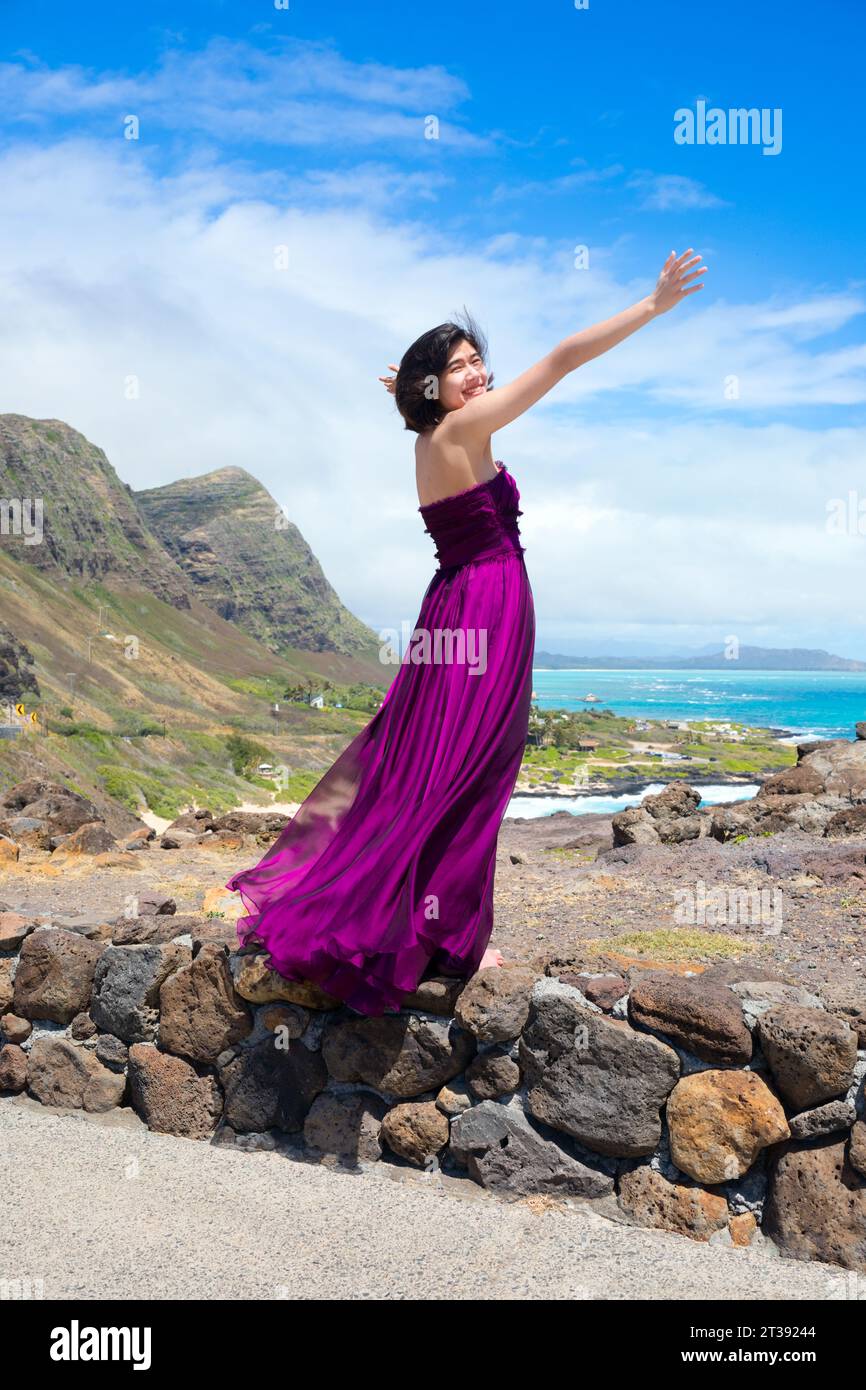 Young woman in formal purple dress standing at Makapu'u Viewpoint  overlooking Makapu'u beach and Hawaiian ocean on Oahu, Hawaii Stock Photo -  Alamy
