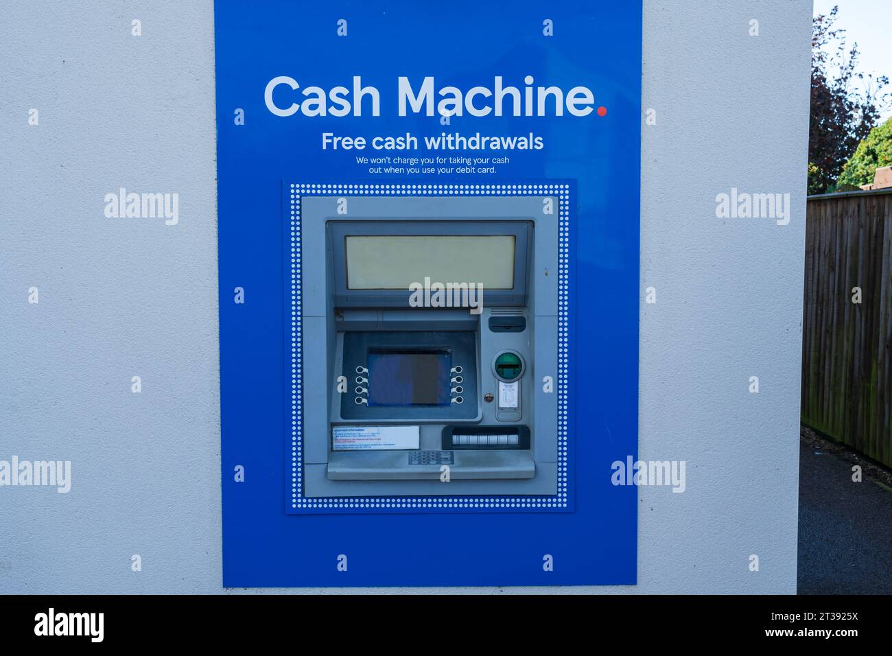 Cash Machine or ATM built into a shop wall in the UK Stock Photo