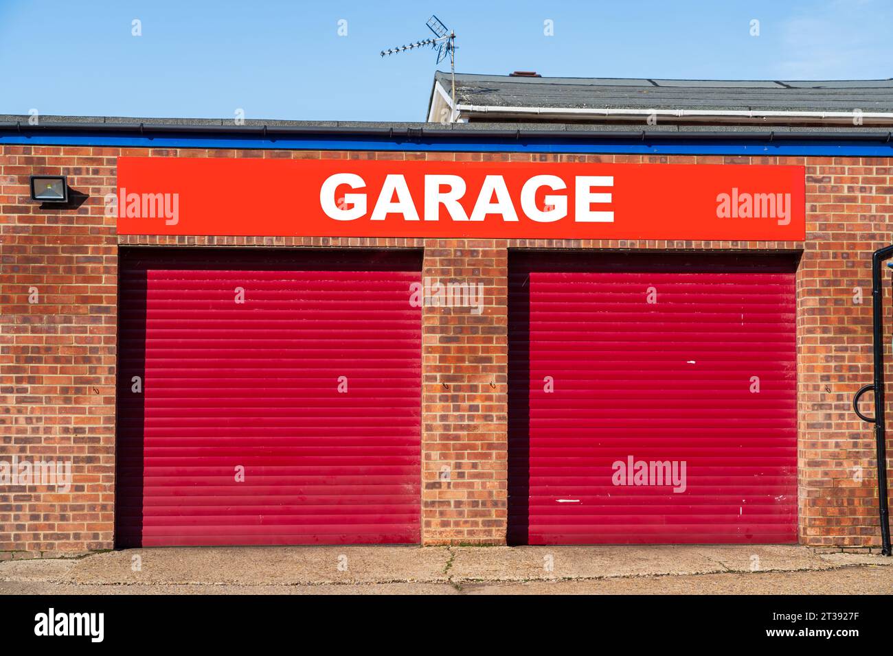 Closed Garage doors with text Garage above Stock Photo Alamy