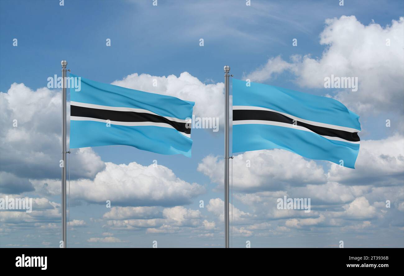 Two Botswana flags waving together on blue cloudy sky, two country ...