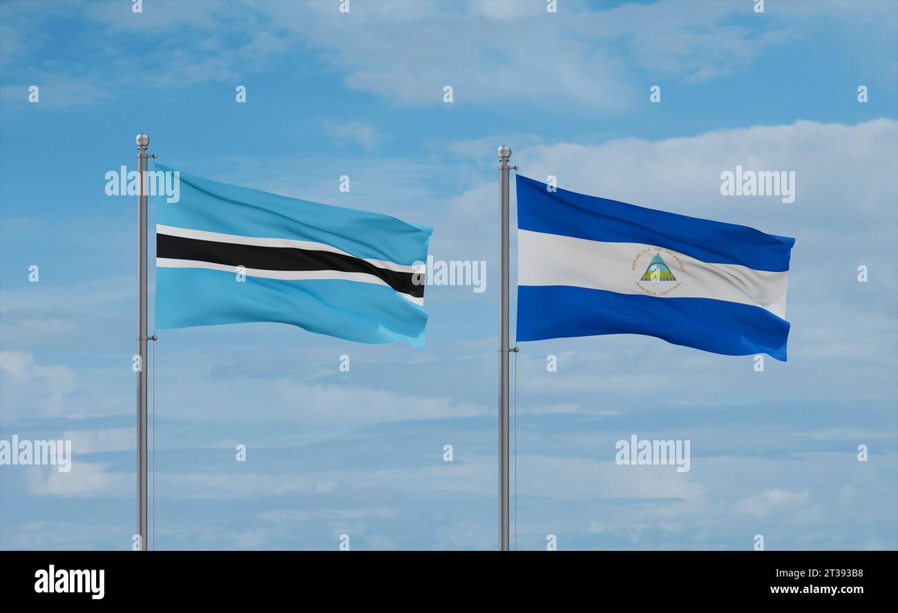 Nicaragua and Botswana flags waving together on blue cloudy sky, two ...