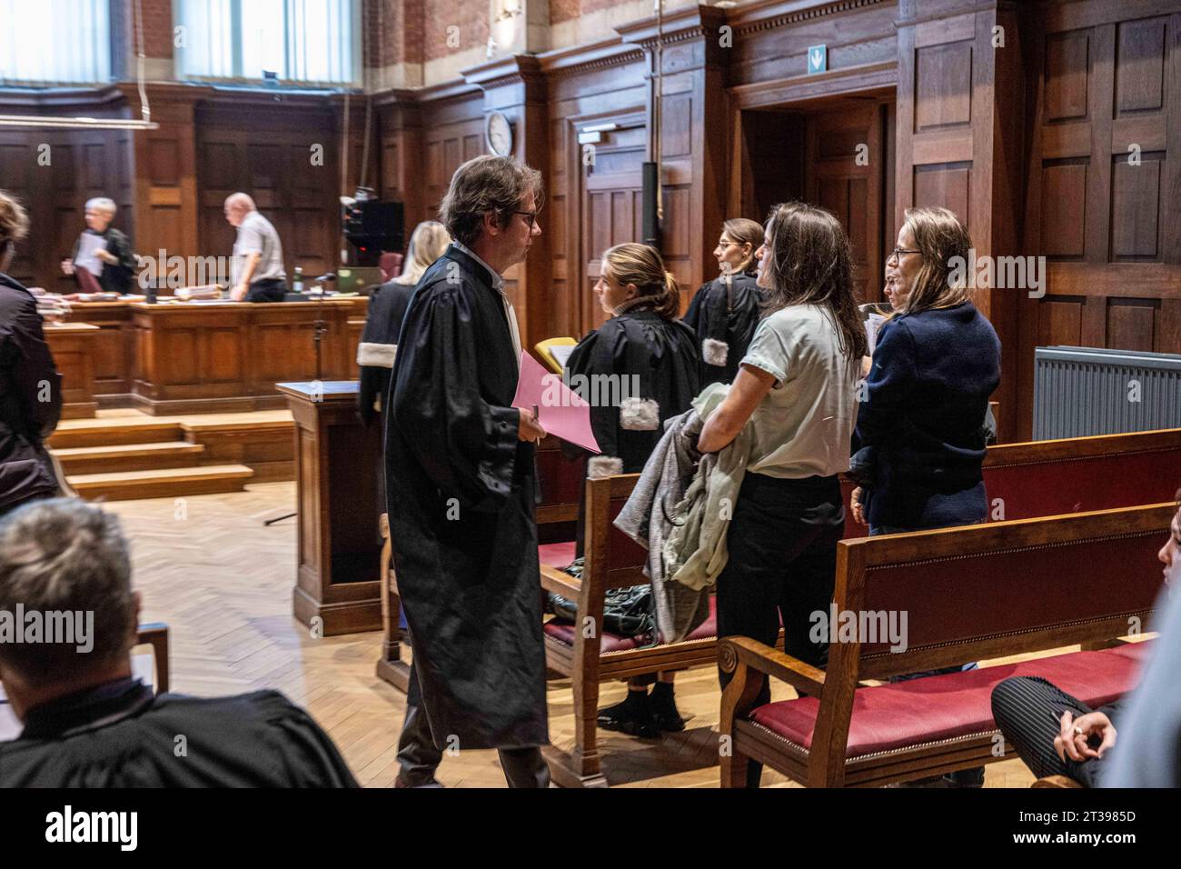 Dendermonde, Belgium. 24th Oct, 2023. lawyer Joris Van Cauter (L) and sisters of Tine Nys look dejected after the verdict in the retrial of the doctor who euthanized Tine Nys, Tuesday 24 October 2023, before the correctional court of Dendermonde. 38-year-old Nys was given euthanasia in 2010 to release her from severe psychological suffering. Her family didn't agree and took legal action. The doctor was acquitted earlier by the East-Flanders assizes court. BELGA PHOTO JONAS ROOSENS Credit: Belga News Agency/Alamy Live News Stock Photo