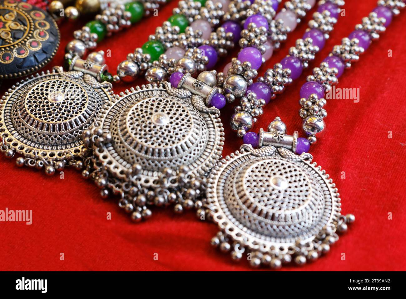 colorful traditional indian jewelry displayed in a street shop for sale