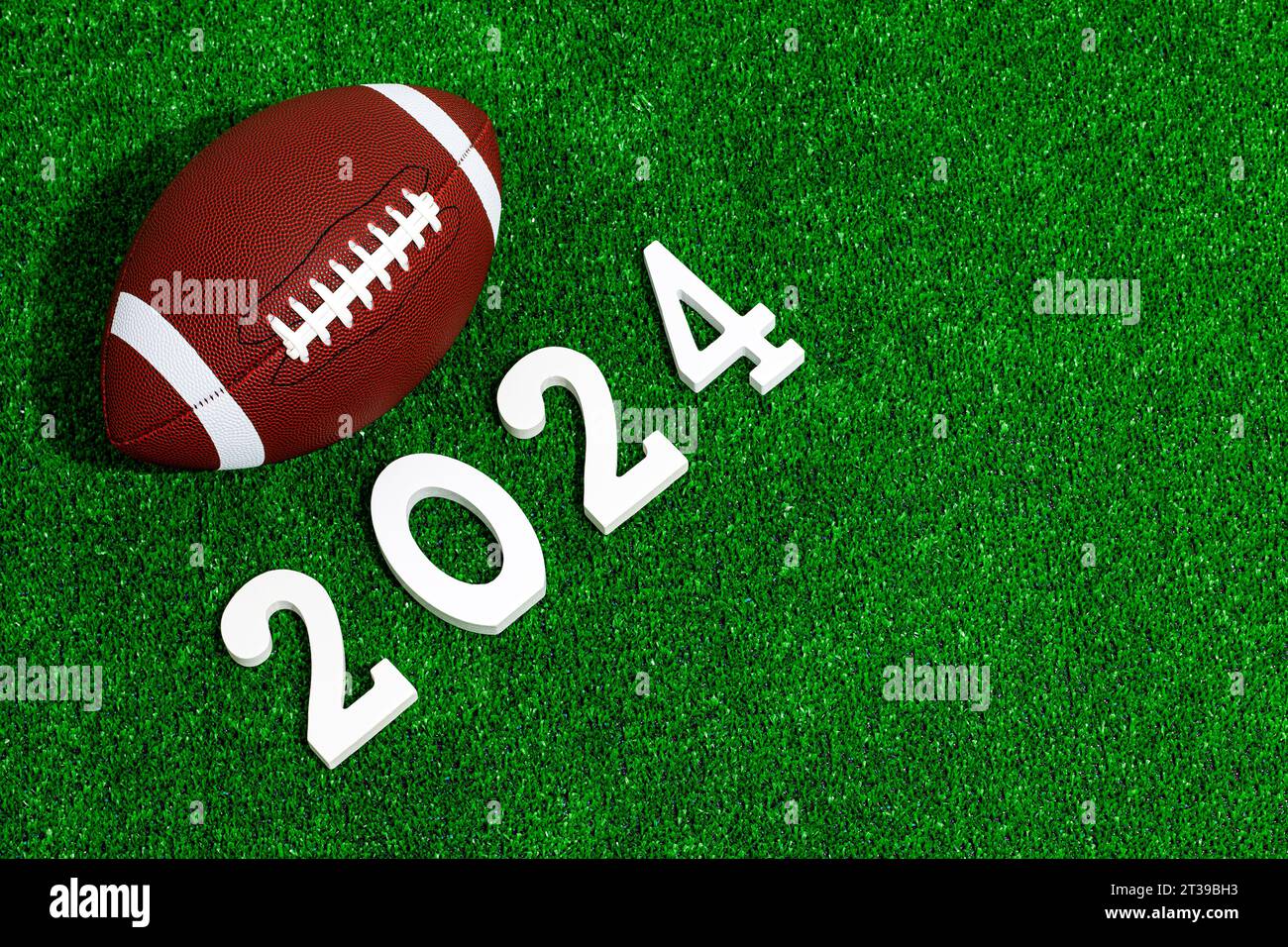 2024 Year Hi Res Stock Photography And Images Alamy   American Football Ball Next To 2024 Number Whose Figures Are Made Of White Painted Wood Isolated Over Green Grass Seen From Above 2T39BH3 