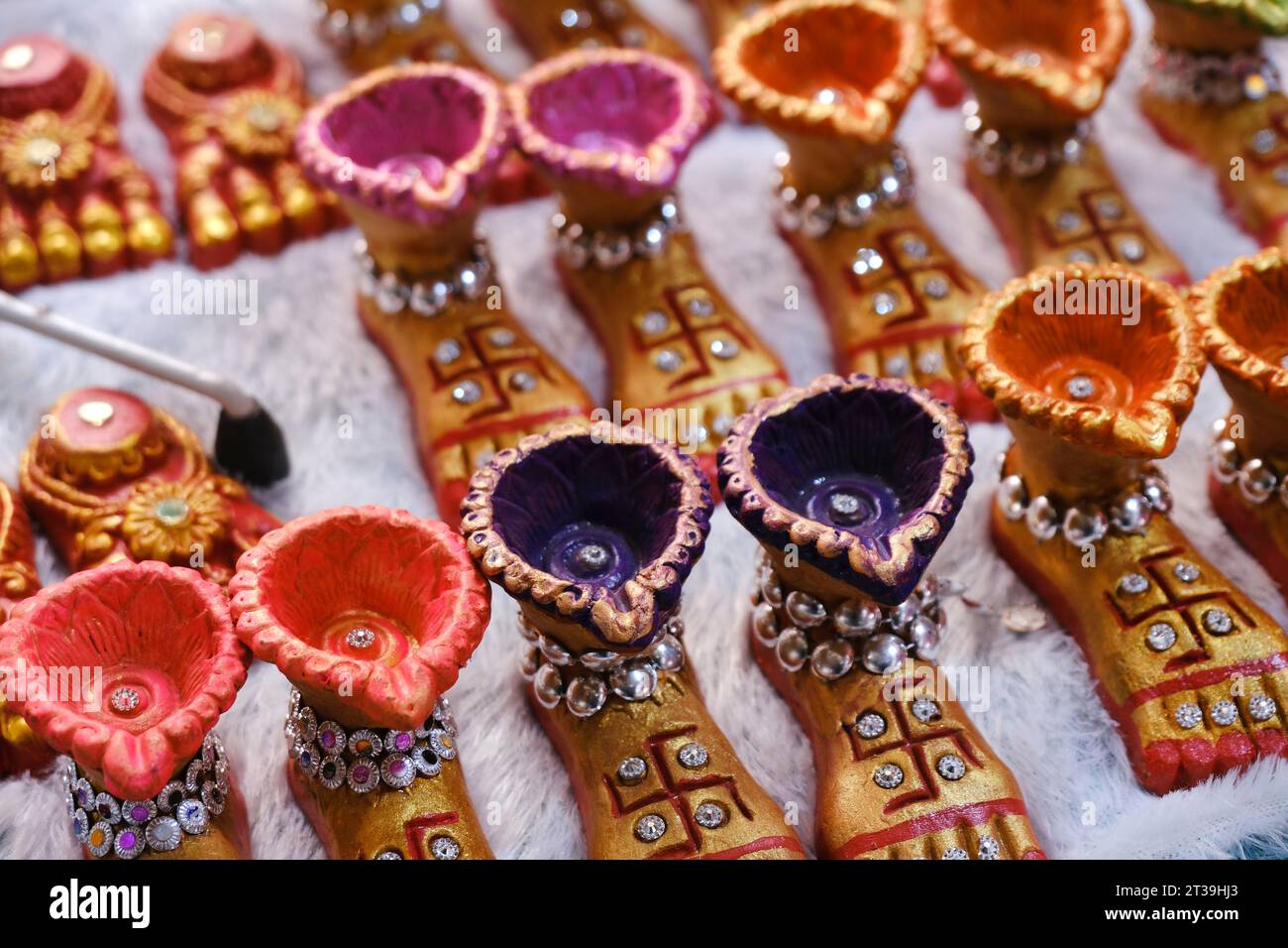 Clay lamp stall for festival celebration, Terracotta diyas or oil lamps for Diwali for sale at a market in India. Stock Photo