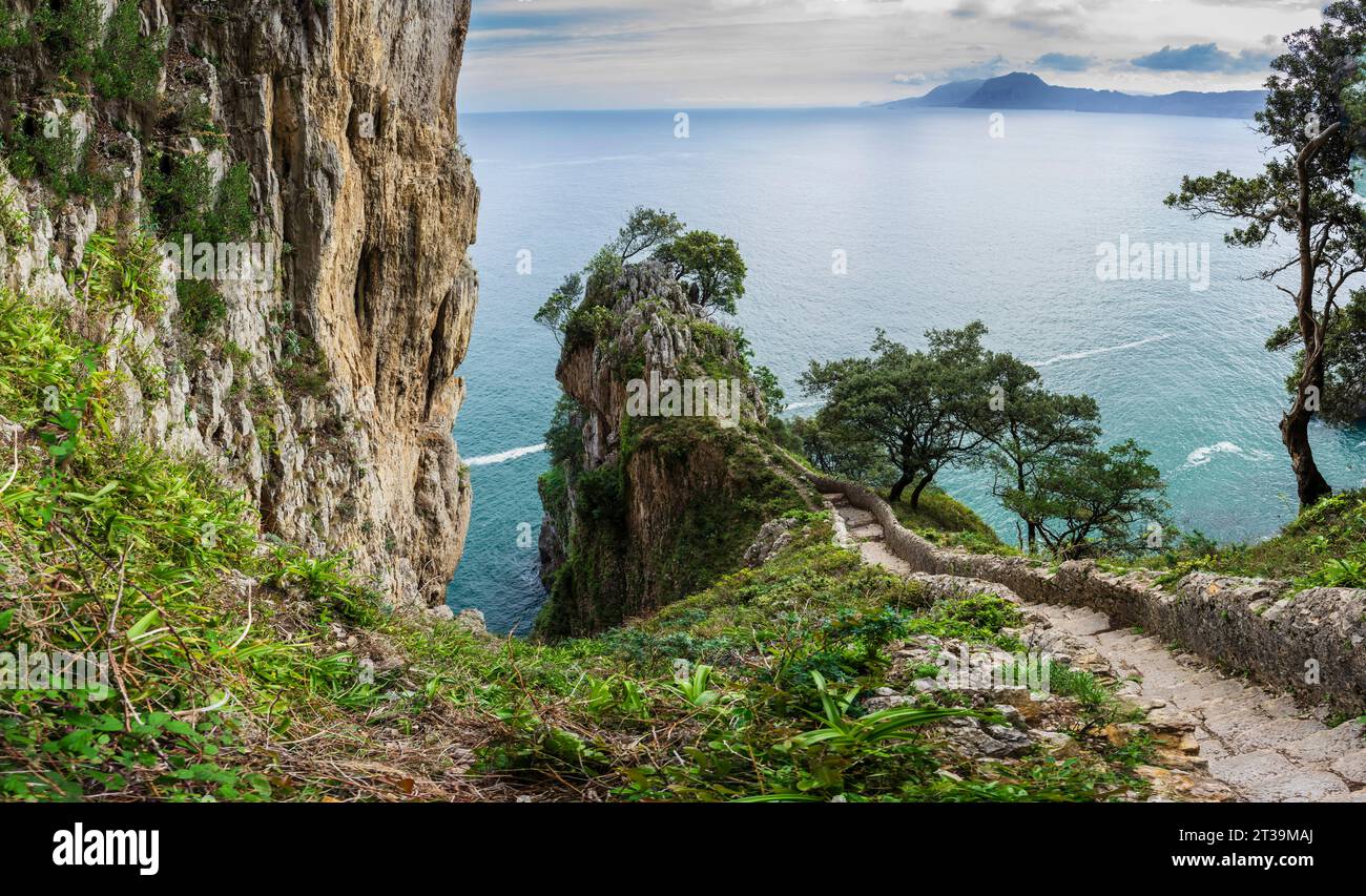 ascent of the stairs of Del Caballo lighthouse, Buciero mountain, Santoña, Cantabria, Spain Stock Photo