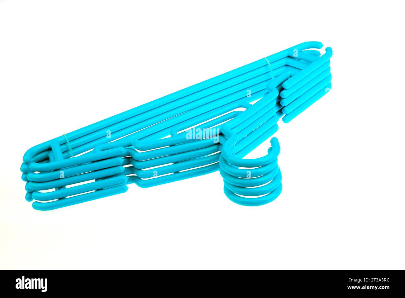 blue plastic hangers on a white background Stock Photo