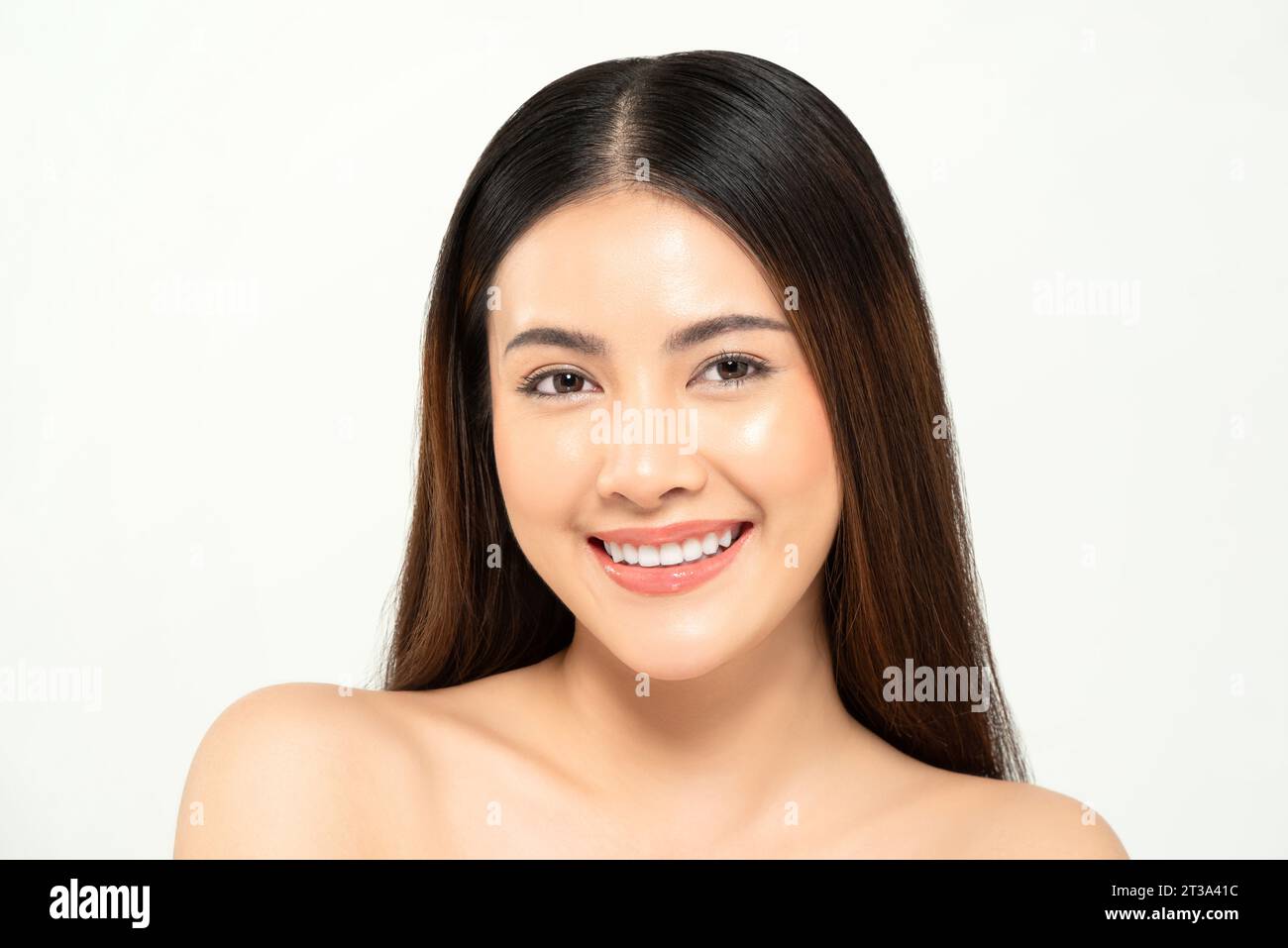 Portrait of clear skin Asian woman face in white background for beauty