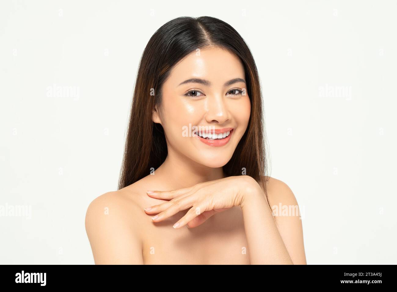 Portrait of clear skin Asian woman face in white background for beauty
